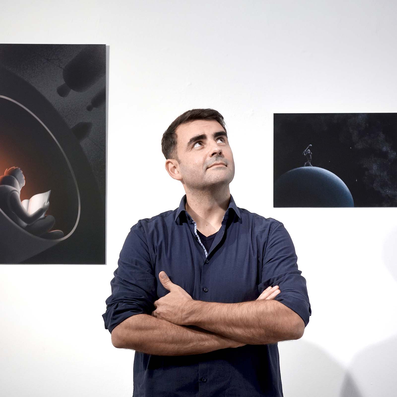 Marin Goleminov in front of paintings by him during the vernissage of his exhibition Space, Ink. Photo by Clemens Fabry